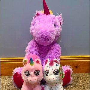 Three Unicorn Stuffed Animals